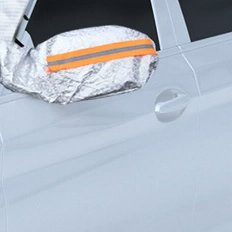 A side mirror inside the cover's sleeve with an orange reflective strip